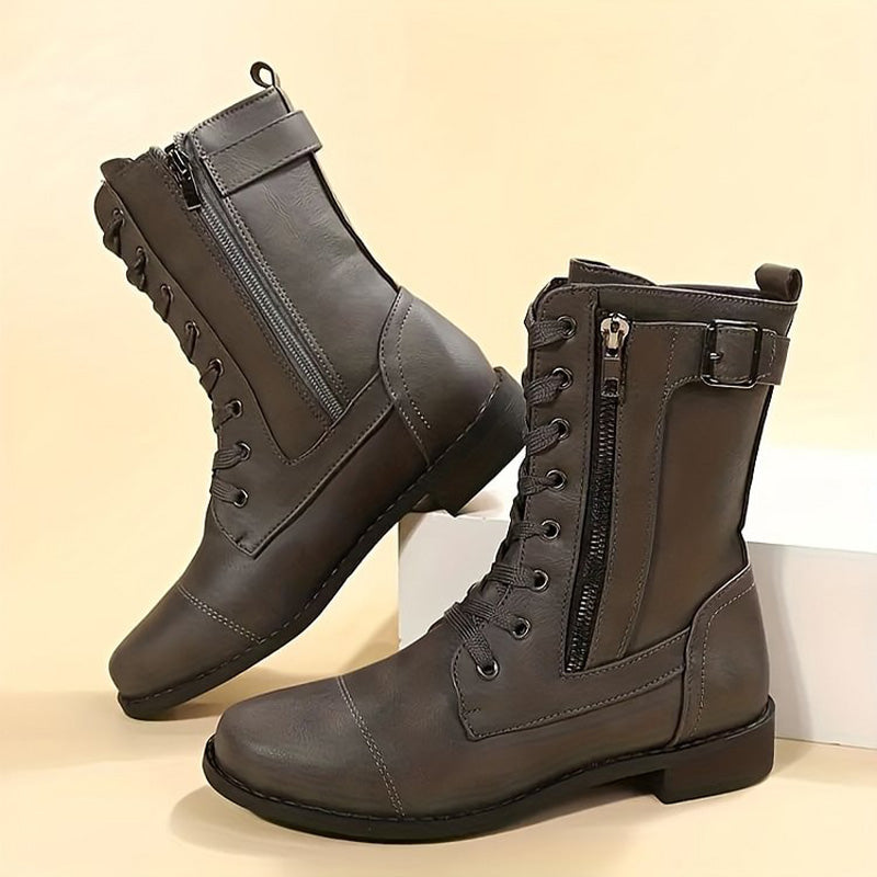 Women's boot with round nose and side zip closure