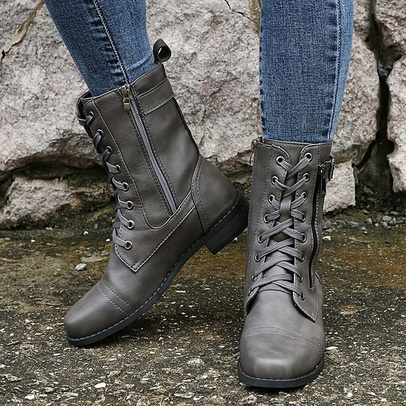 Women's boot with round nose and side zip closure